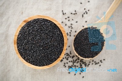 Black Sesame In Wood Bowl Stock Photo