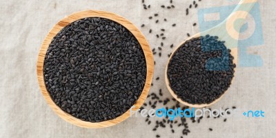 Black Sesame In Wood Bowl Background Stock Photo