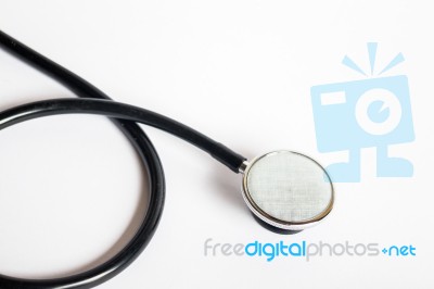 Black Stethoscope On White Background Stock Photo