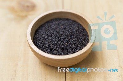 Black Sweet Basil Seed In Round Wooden Bowl Stock Photo