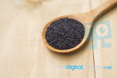 Black Sweet Basil Seed On Wooden Spoon Stock Photo