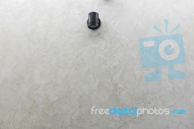 Black Wall Lamp On Grey Mortar Wall Background Stock Photo