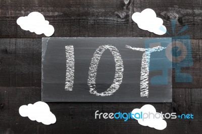 Blackboard Written With The Letters Iot, The Internet Of Things Stock Photo