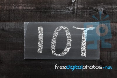 Blackboard Written With The Letters Iot, The Internet Of Things Stock Photo