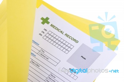 Blank Medical Record In Yellow Folder Stock Photo