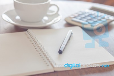 Blank Notebook With Pen On Wooden Table Stock Photo