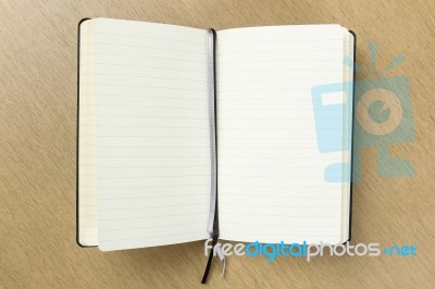 Blank Opened Notebook With Bookmark Ribbon Stock Photo