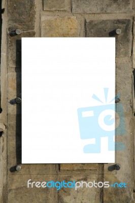 Blank Sign Over Pannel Rock Background Stock Photo