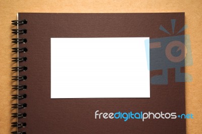 Blank White Paper On Notebook Stock Photo