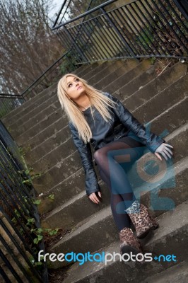 Blonde Caucasian Girl Posing Outdoors Stock Photo