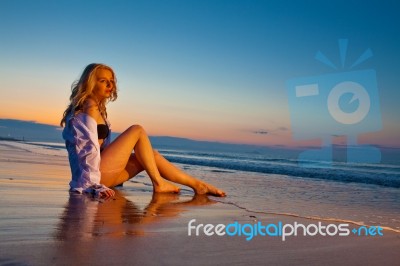 Blonde Girl On The Beach Stock Photo