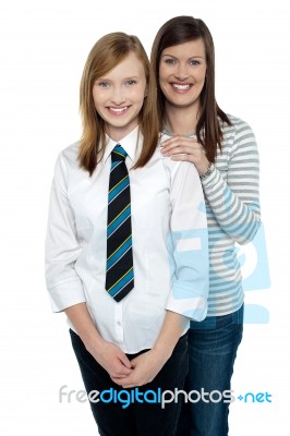 Blonde Mother And Daughter Posing Together Stock Photo