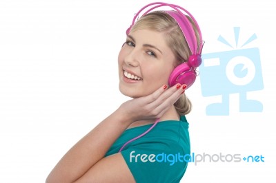 Blonde Teen Listening To Music Stock Photo