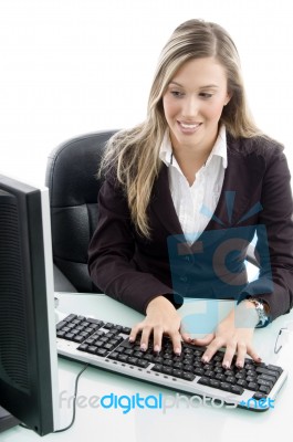 Blonde Woman Working On Computer Stock Photo