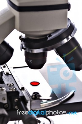 Blood Drop Sample On Test Glass Plate Under Microscope Lens Stock Photo