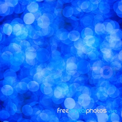 Blue Abstract Background Of Blurred Lights With Bokeh Effect Stock Photo