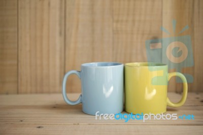 Blue And Yellow Coffee Mug Stock Photo