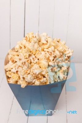 Blue Box Full Of Sweet And Tasty Popcorn Stock Photo