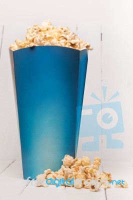 Blue Box Full Of Sweet And Tasty Popcorn Stock Photo