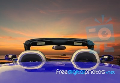 Blue Car With Twilight Background Stock Photo