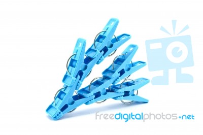 Blue Clothes Pegs Stock Photo