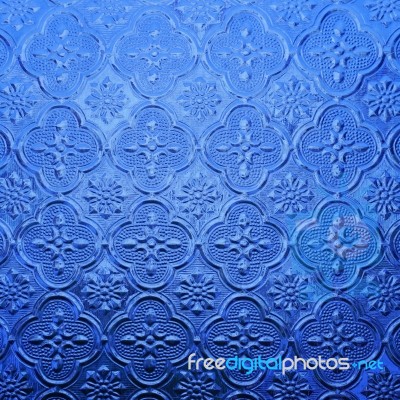 Blue Color Glass With Thai Pattern Style Stock Photo