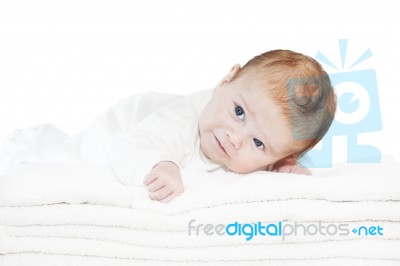 Blue Eyes Baby Boy On White Towels Stock Photo