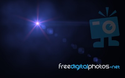 Blue Glowing Light Glitter Background Effect.digital Lens Flare With Bright Light In Black Background Stock Image