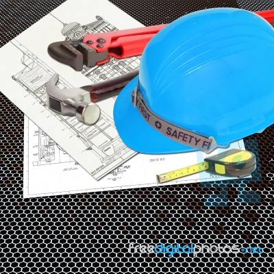 Blue Hard Hat On Blueprint Stock Photo