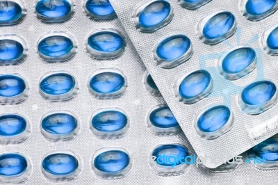 Blue Oil Pills Stock Photo