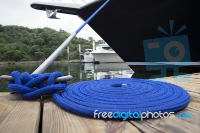 Blue Rope With Mooring Bollard Stock Photo