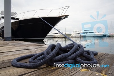 Blue Rope With Mooring Bollard Stock Photo