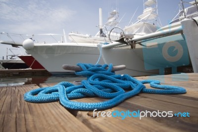 Blue Rope With Mooring Bollard Stock Photo