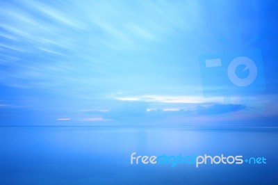 Blue Sea And Sky At Dusk Stock Photo