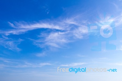 Blue Sky And Tiny Cloud Background Stock Photo