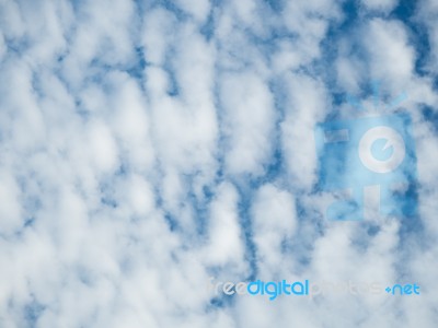 Blue Sky Background With A Tiny Clouds Stock Photo