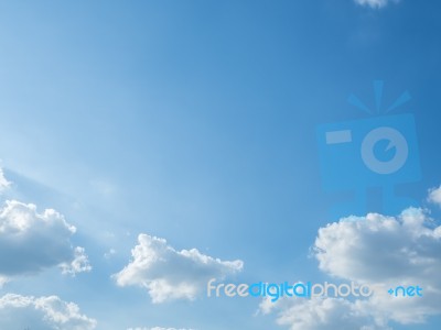 Blue Sky Background With Tiny Clouds Stock Photo