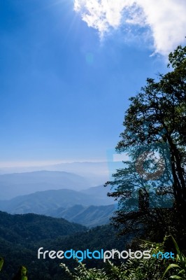 Blue Sky On Mountain Vertical Stock Photo