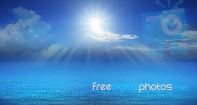 Blue Sky Sun Beam Over Sea Stock Photo