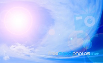 Blue Sky With Clouds And Sun Stock Photo