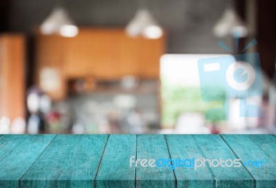 Blue Top Wooden With Abstract Blur Coffee Shop Background Stock Photo