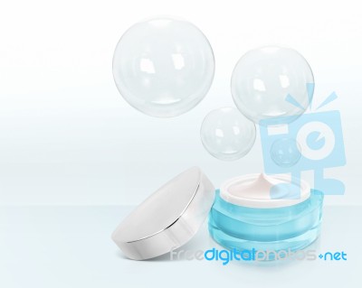 Blue Triangle Cosmetic Jar On Bubble Background Stock Photo