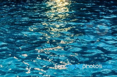 Blue Water Surface That Reflects Light Stock Photo