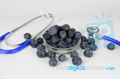 Blueberry In Glass Bowl On White Background. Healthy Food Stock Photo