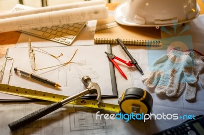 Blueprints, Hardhat, Glasses, Stickers, Construction Level, Pen Stock Photo