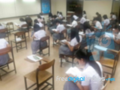 Blur Background University Students Writing Answer Doing Exam In… Stock Photo