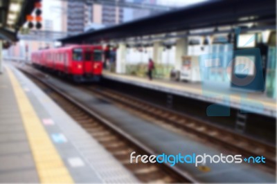 Blurred Abstract Background Of  People Waiting At The Train Station In Japan Stock Photo