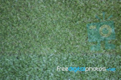 Blurred Background Of Artificial Green Grass Stock Photo