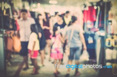 Blurred Crowd Of People In The Market Stock Photo