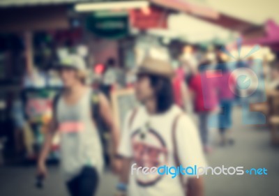 Blurred Crowd Of People In The Market Stock Photo